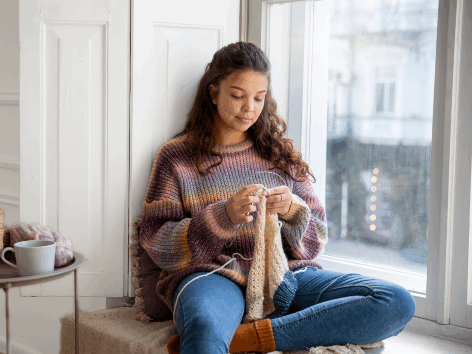girl knitting as a form of rest