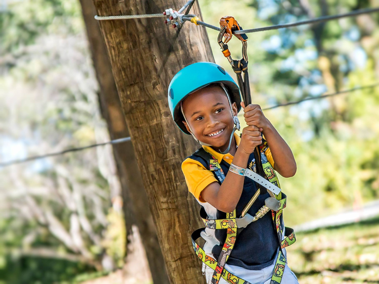 weekend getaways: hot springs; boy on zipline