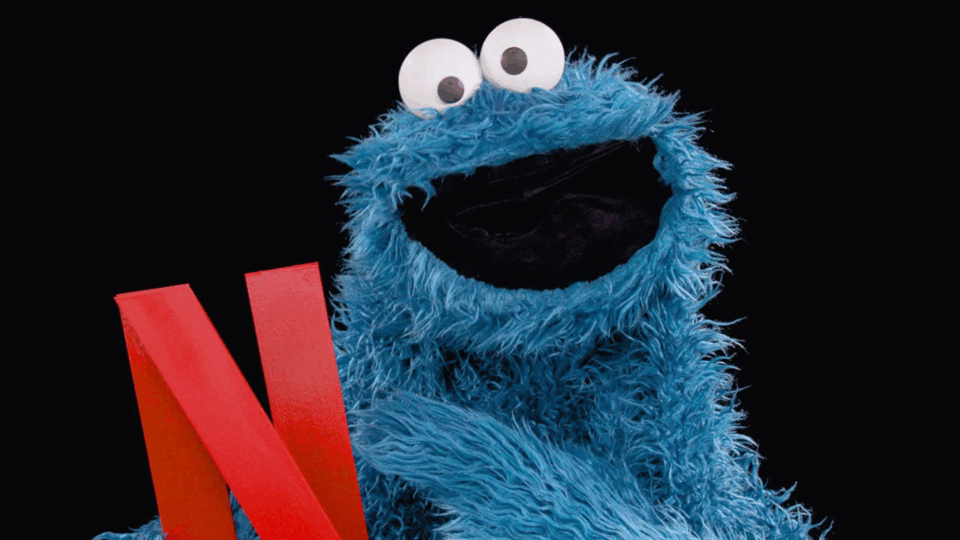 cookie monster holding n for netflix for sesame street