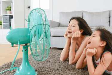 cool gear for hot days; woman daughter in front of fan