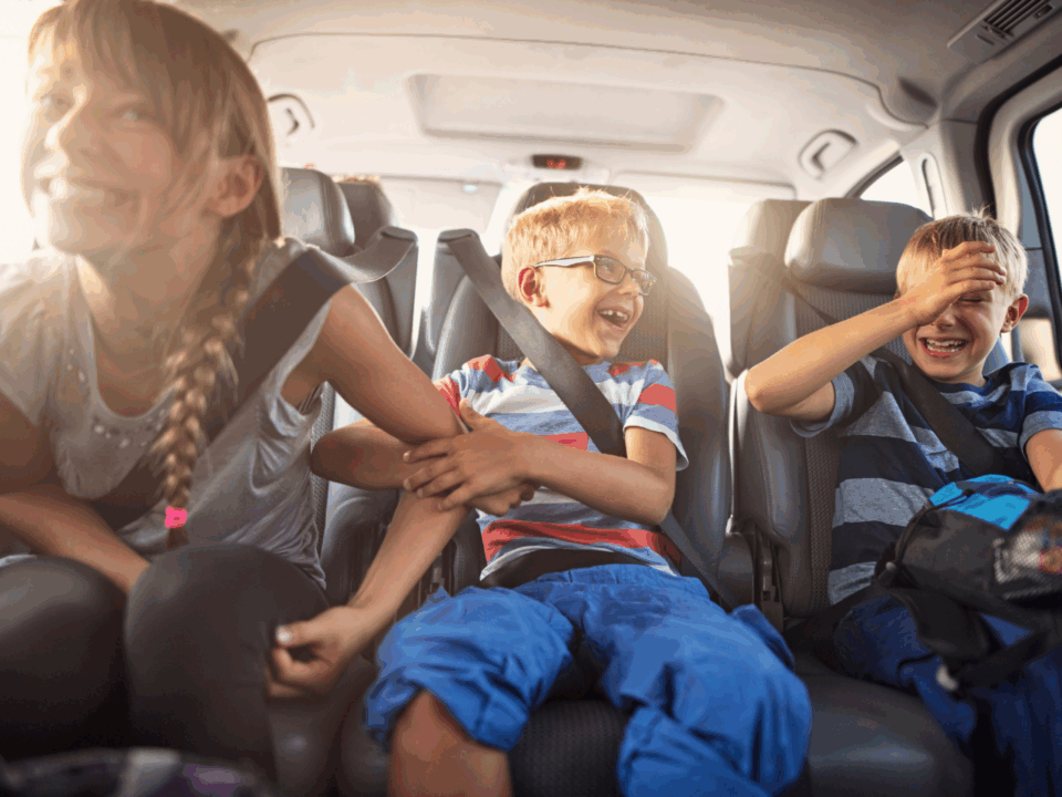 kids in car on family vacation