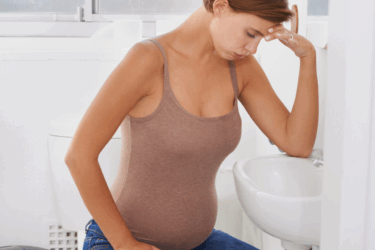 pregnant mom dealing with morning sickness