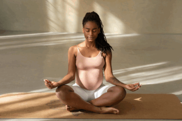 pregnant mom practicing meditation and self-care