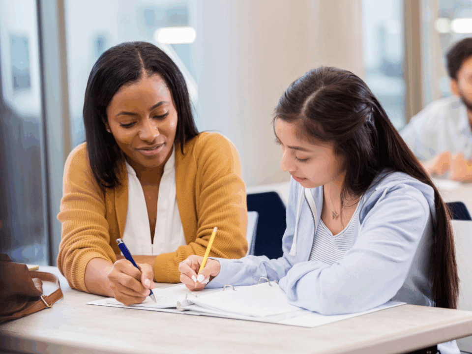 tutor working with student; tutoring centers