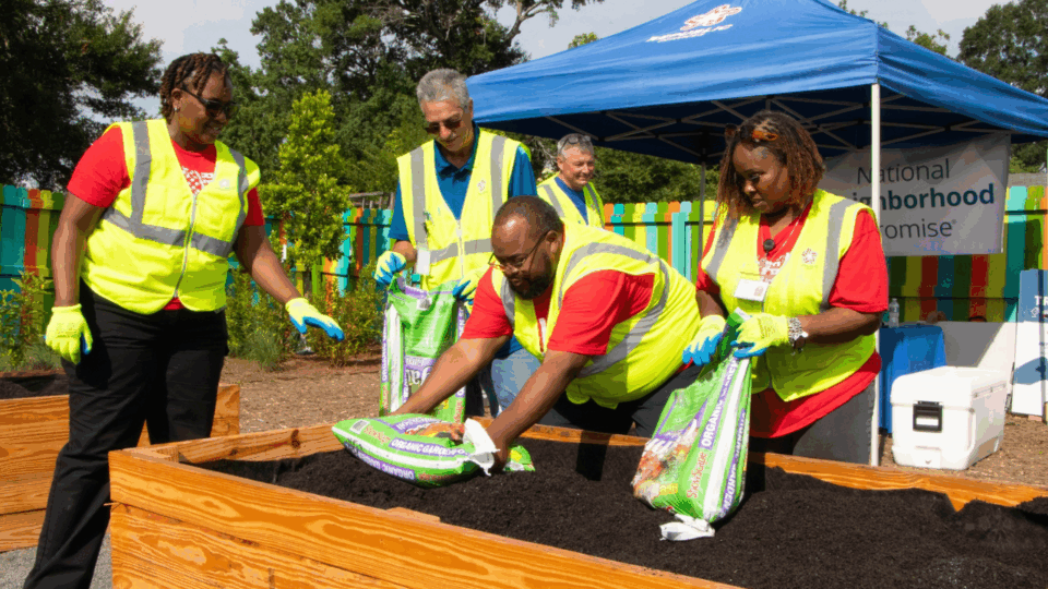 erie street park; volunteers working on garden