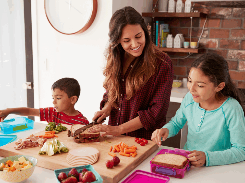 children packing school lunch with parent