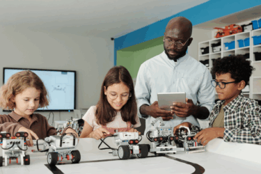 robotics; teacher working with students