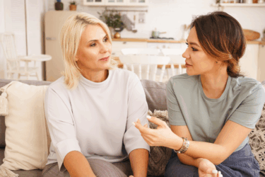 two adults talking; parenting advice