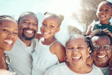 generations; passing down stories; family posing together