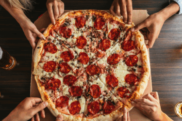 pizza spots; family eating pizza