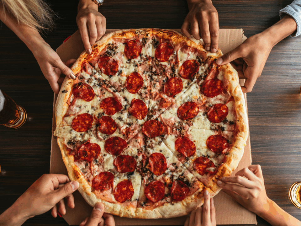pizza spots; family eating pizza