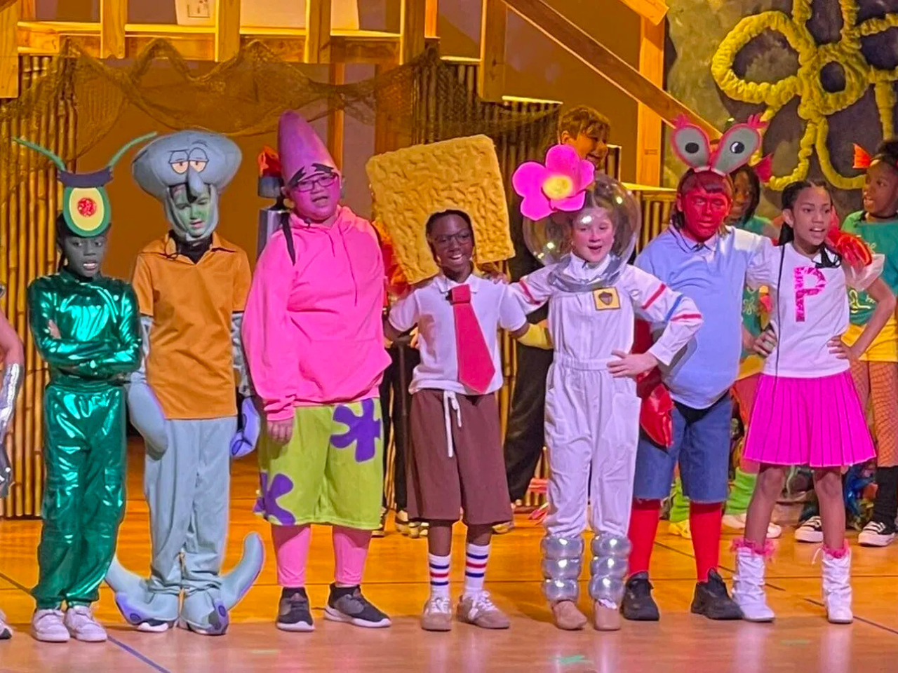 East Baton Rouge Parish Schools; the cast of spongebob standing together on stage