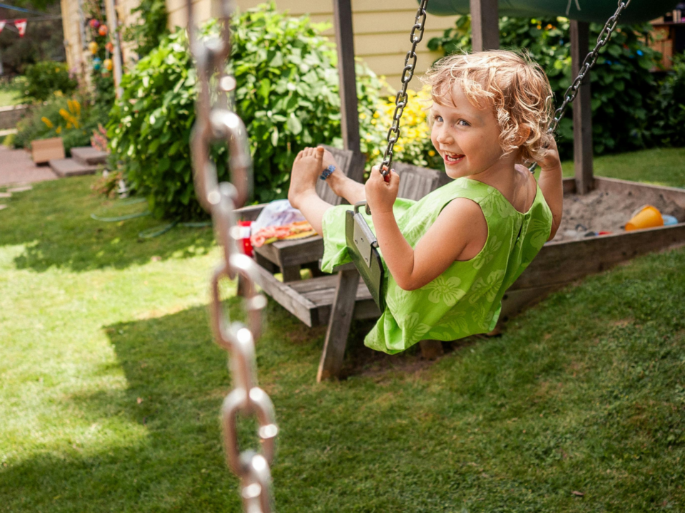 empty weekend; kid swinging on swing outside