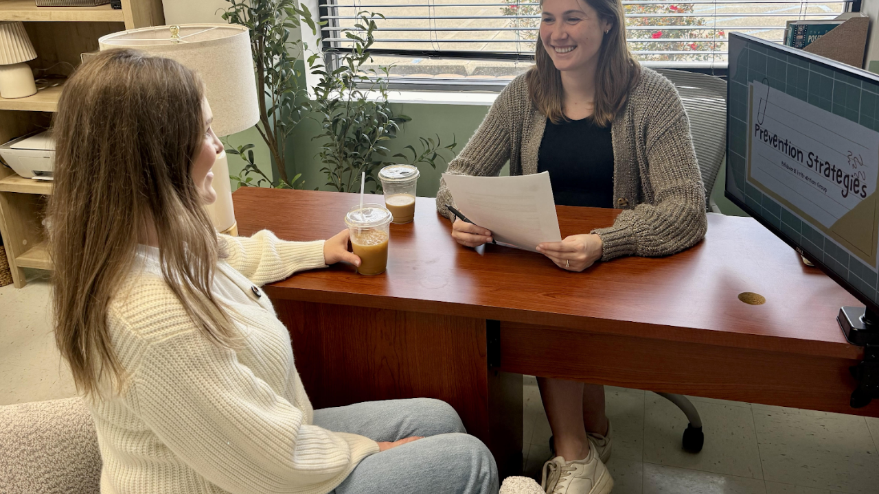 Behavioral Intervention Group; two women talking while drinking coffee