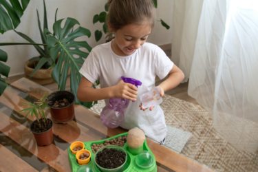 girl working on fun projects with plants