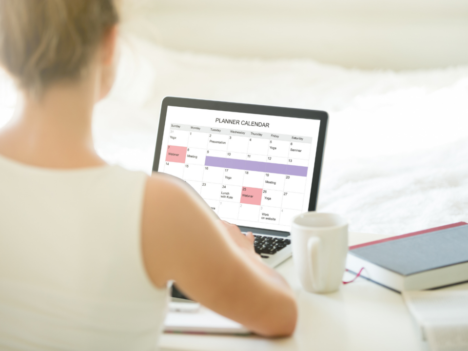 mom keeping family organized with digital calendar